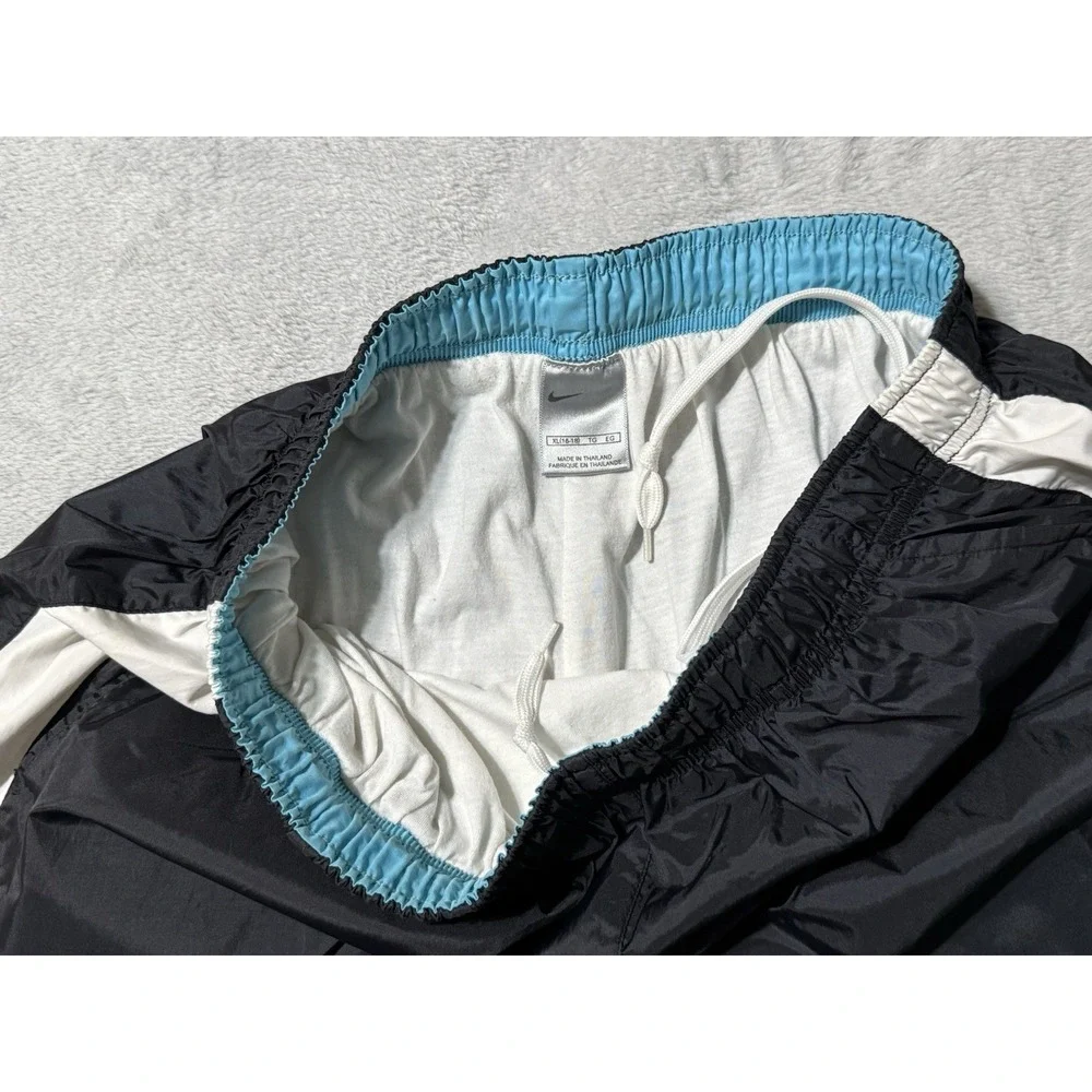 VTG Nike Mens XL Track Pants Windbreaker Black Nylon Ankle Zip Running